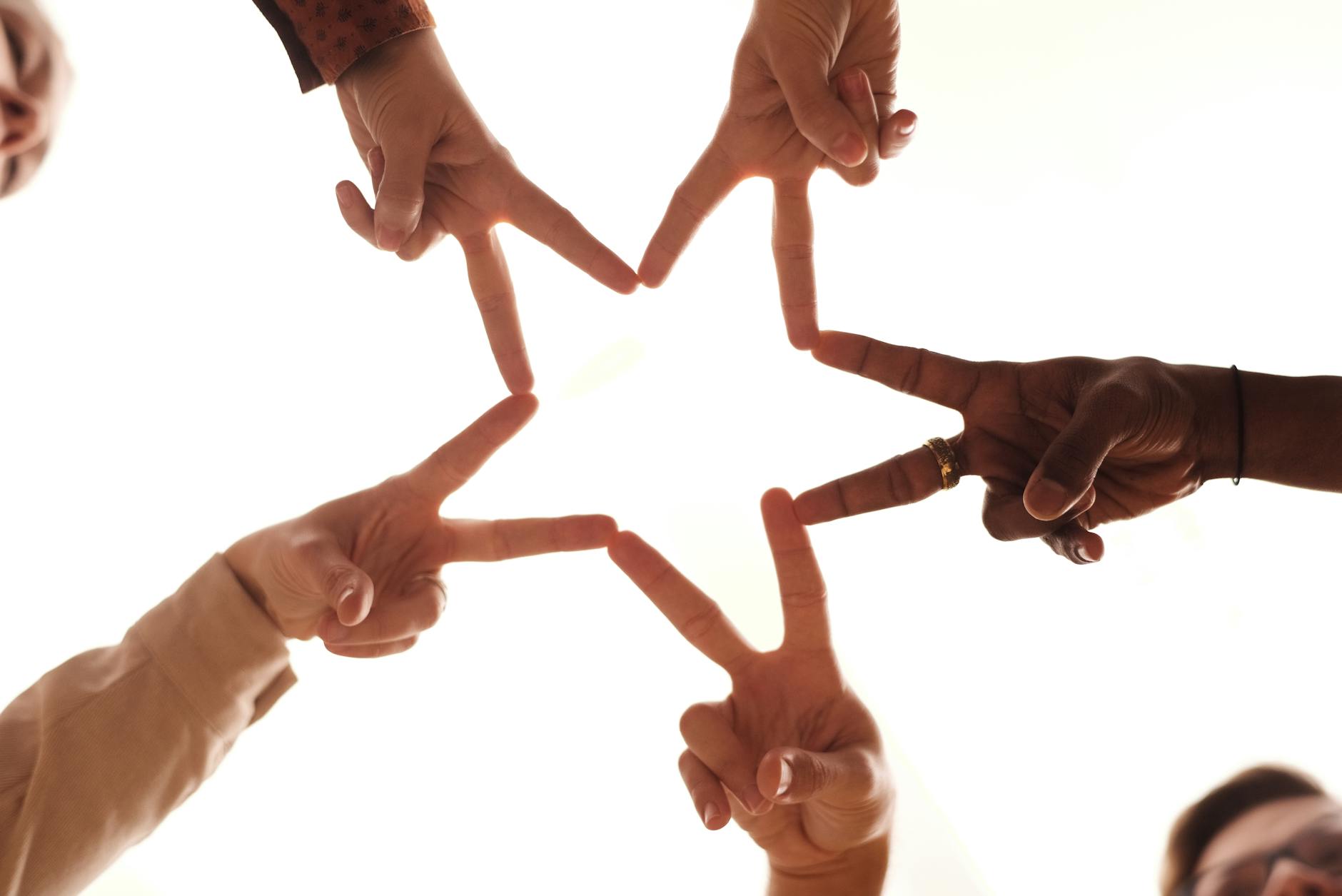 hands making a star